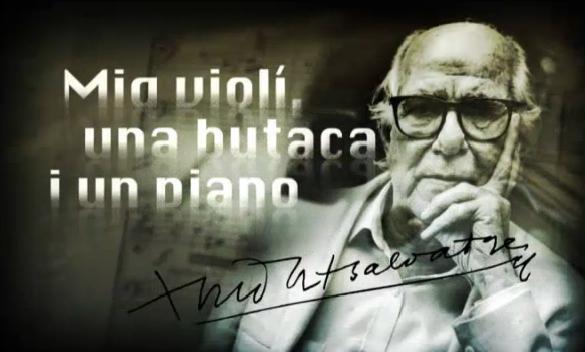 Mig violí, una butaca i un piano